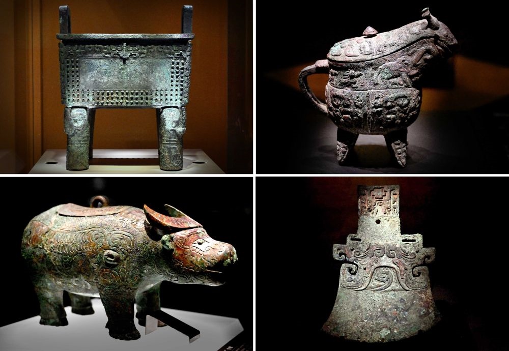 這是殷墟博物館新館內(nèi)展出的“司母辛”銅鼎（左上）、“亞長(zhǎng)”銅觥（右上）、“亞長(zhǎng)”牛尊（左下）、“亞長(zhǎng)”銅鉞（拼版照片，2月23日攝）。