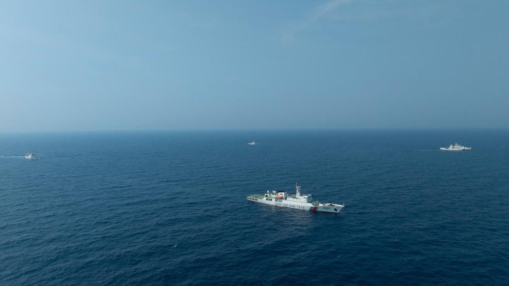 4月22日，中越海警艦艇編隊在北部灣海域開展聯(lián)合巡邏。（中國海警供圖）